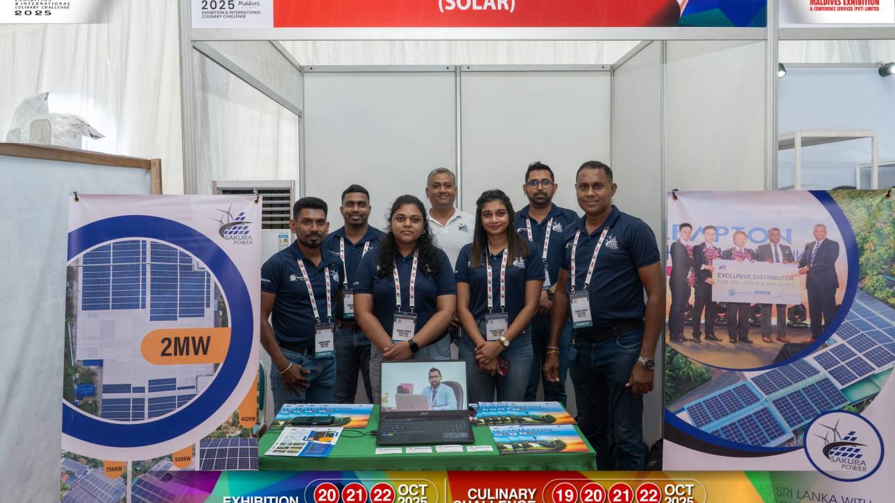 Team at solar energy exhibition booth